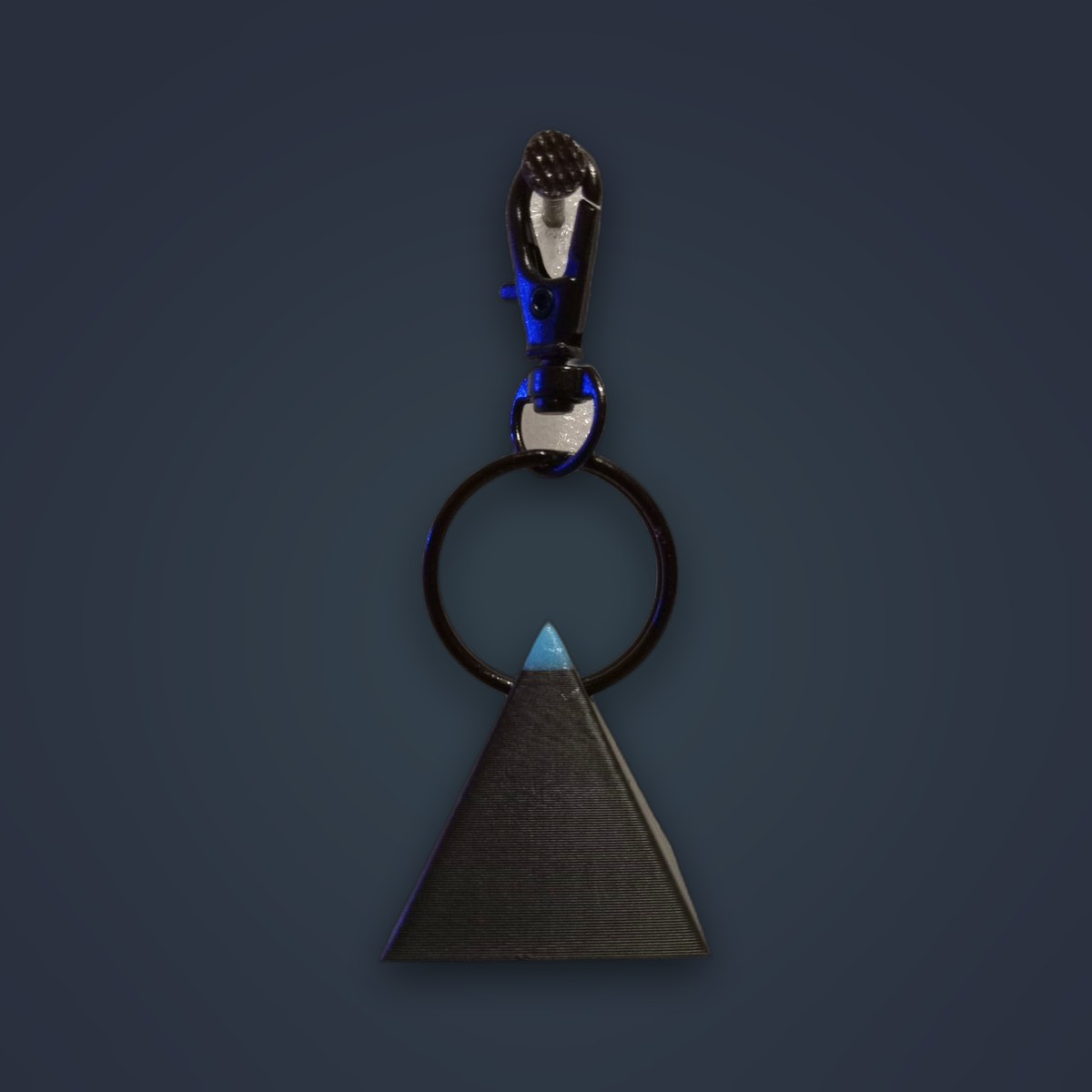 Comets keychain, Black colorway, angle 2 of 2