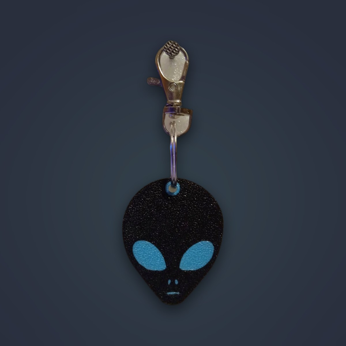 Greys keychain, Black / Blue Eyes colorway, angle 1 of 2